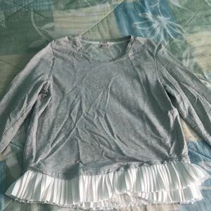 Long sleeve shirt with ruffles at The bottom
